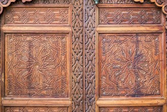 Carved wooded doors at the Heritage Museum