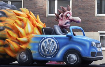 Burning VW car with monkey in exhaust gas cloud