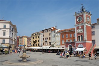 Old town with Venetian clock tower and fountain