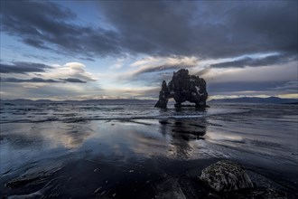 Cloudy atmosphere with reflection at Hvitserkur