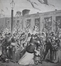 The soldiers of the Guard Landwehr are received by their families at the Potsdam station of Berlin