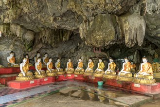 Sitting Buddha statues in the Bayin Nyi Cave Temple