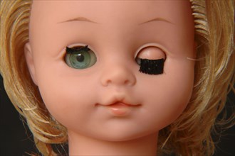 Doll winking with eyes