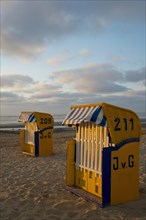 Yellow beach chairs during off-season