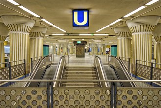 Intermediate floor of the subway station Bockenheimer Warte with escalator to the platforms