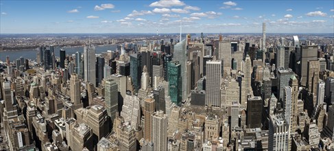 Panoramic view of skycrapers around Times Square and Midtown Manhattan from Empire State Building