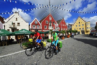 Cyclists in the old town of Abensberg