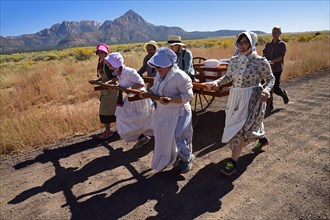 Mormons with handcarts recreate the harsh conditions of colonizing the American West