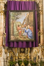 Restored Lent scarf hangs in church above altar