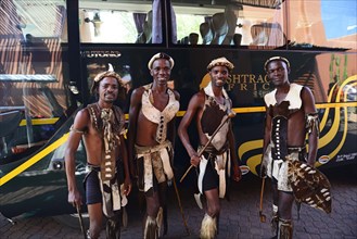 Dancers in traditional costumes welcome tourists at Avani Victoria Falls Resort