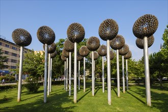 Flower sculptures from ammunition and weapons in the municipal park