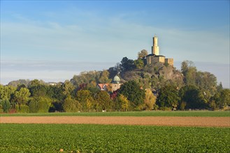 Felsburg castle above the city of Felsberg in autumn