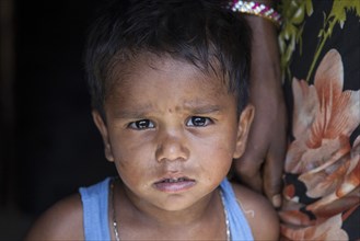 Child in a slum at the Ghazipur garbage dump