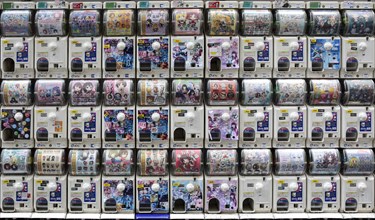 Gachapon machines with toys in small capsules on the electronics mile Akihabara