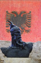 Bust of Skanderbeg and mosaic of the Albanian flag