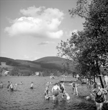 Bathing people in a lake near Freiburg