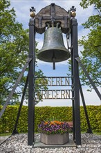 War memorial with bell at the church Maria-Himmelfahrt