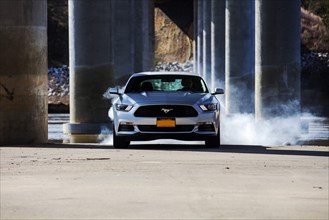 Ford Mustang 2015 model with burnout
