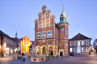 Historical town hall of the city Meppen with Munsterland stepped gable at dusk