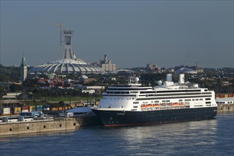 Cruise ship Rotterdam with Olympic Stadium behind
