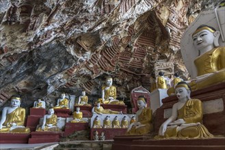 Buddha statues in the Kawgun Cave