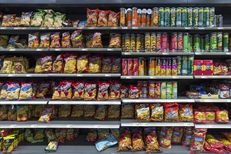 Snacks in a supermarket shelf
