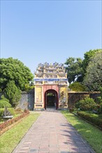 The decorative yellow gate leading to the Mieu temple inside the imperial citadel