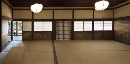 Traditional Japanese interior with tatami mats and painted shoji sliding screens in Sanbo-in