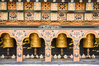 Buddhist prayer wheels in a temple