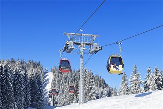 Gondola lift in the Winklmoos-Alm ski area with gold medal gondola by Rosi Mittermaier