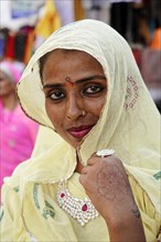 Indian woman with yellow scarf