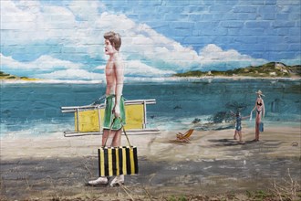 Man in swimming trunks going to the beach