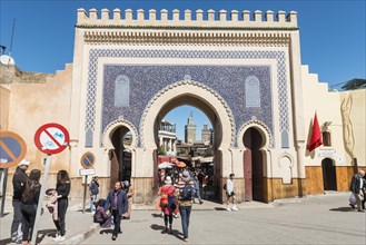 Locals and tourists in front of Bab Boujeloud
