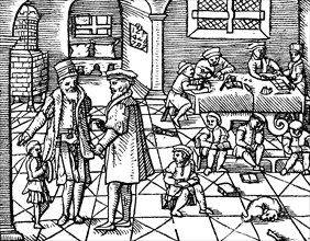 Interior of a school for writing and arithmetic in the 16th century