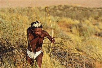 Bushman of the San people hunting