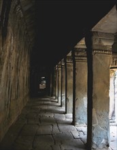 Dark Arcade in Khmer Temple Ruin