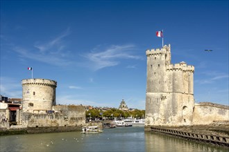 Towers Tour Saint Nicolas and Tour de la Chaine at the entrance to the ancient port of La Rochelle