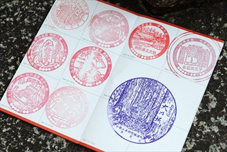 Pilgrim passport with registered stamps of the pilgrim station