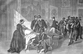 King William I visits the wounded in the military hospital of the Palace of Versailles
