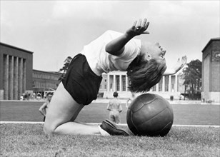 Woman with medicine ball