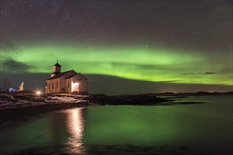 Church at the coast with northern lights