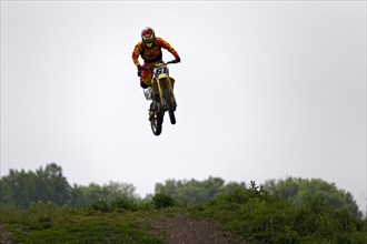 Motocross rider performing a stunt