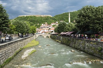 Bistrica river with stone bridge and fortress dominating Prizren