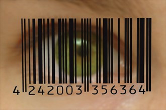 Barcode in front of green eye