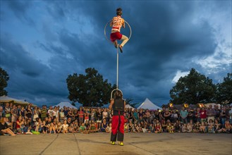 Acrobats and audience