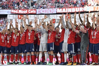 Cheering FC Bayern Munich team after handing over the championship cup