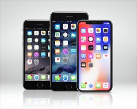 Apple iPhone X on right