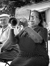 Grandma plays trumpet ca. 1970s