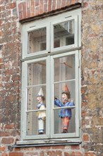 Punchers in the window of the Theatre Figure Museum