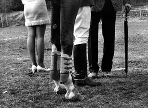 Two horse legs and six human legs ca. 1970s